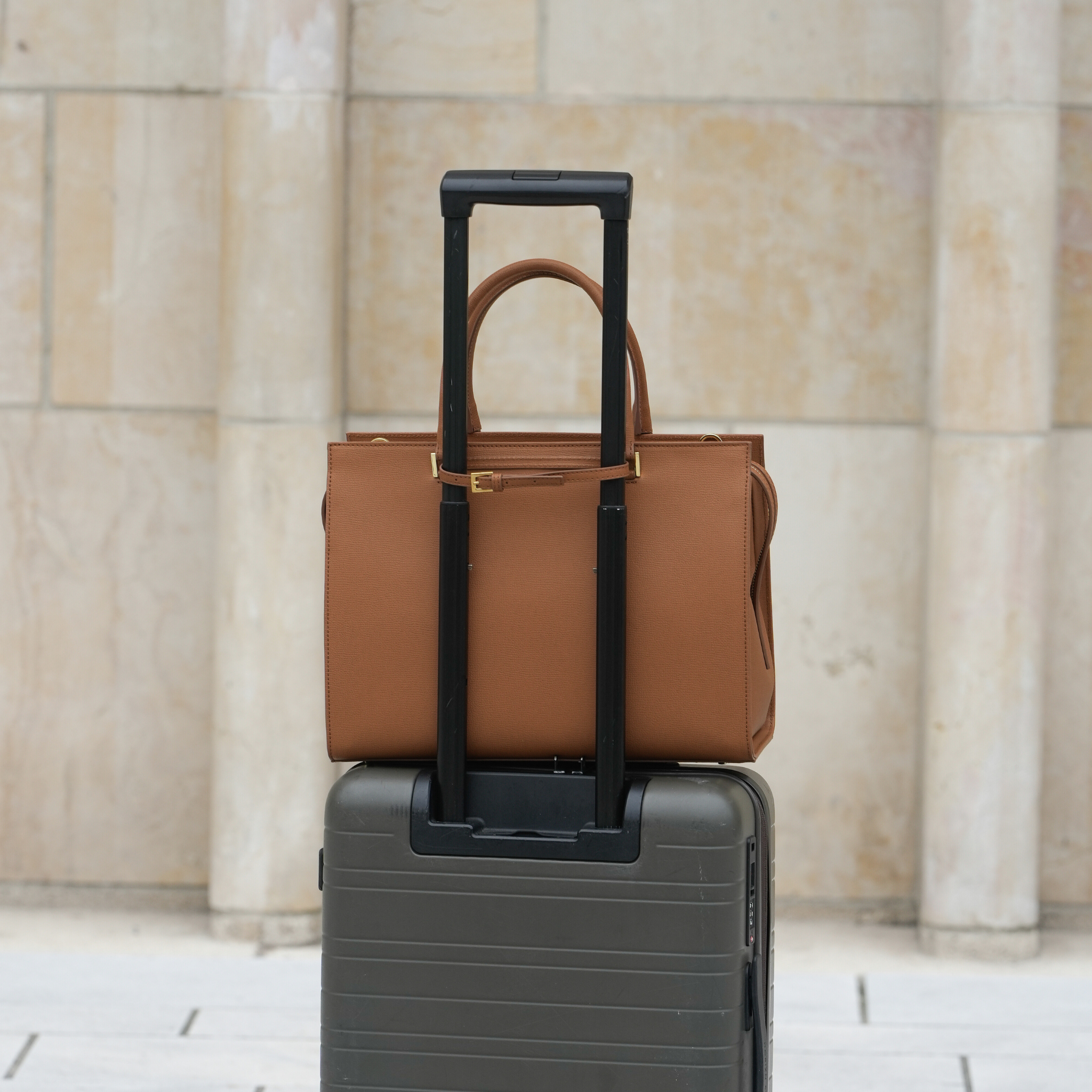 AMELI Zurich | CENTRAL | Cognac | Pebbled Leather | On suitcase