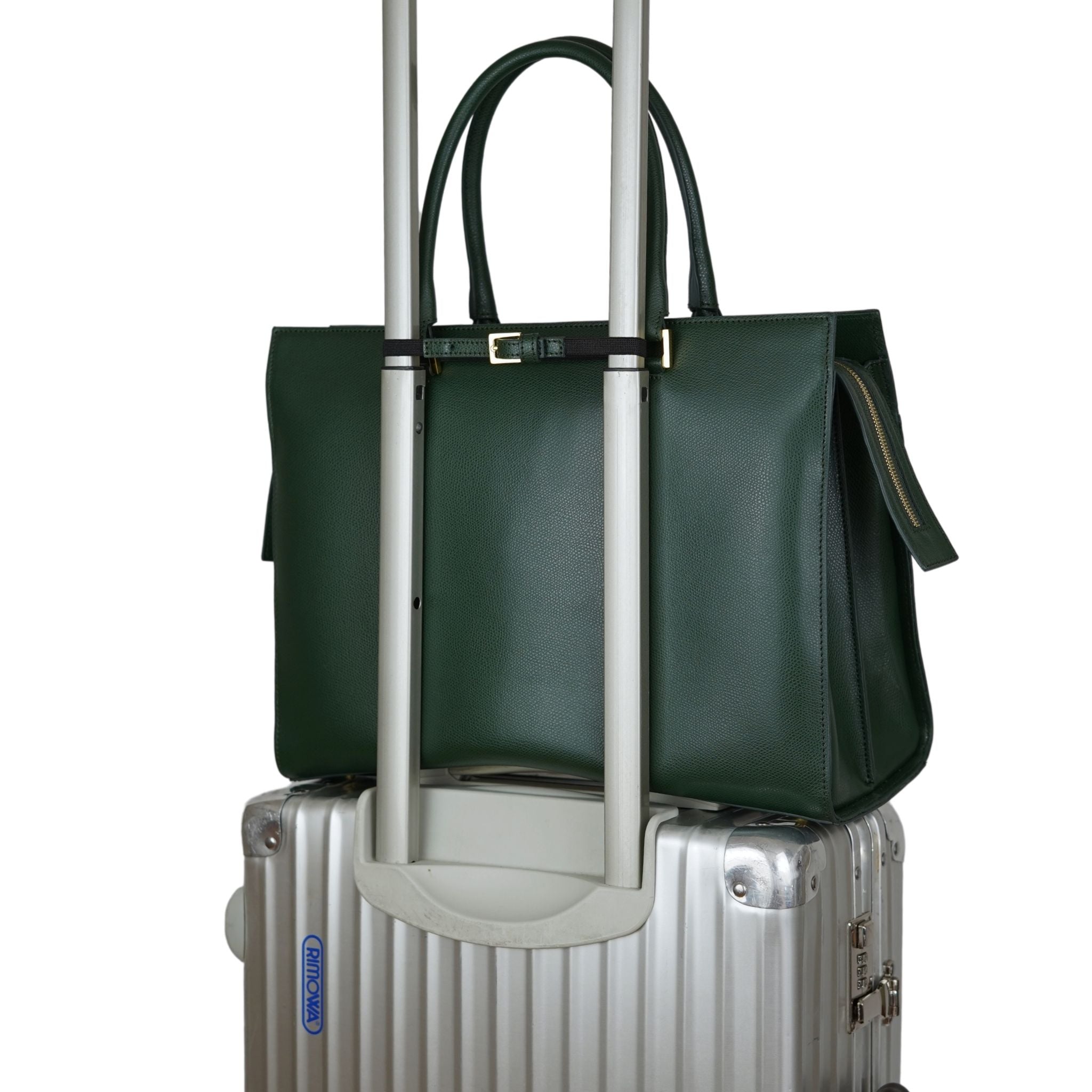 AMELI Zurich | CENTRAL | Dark Green | Pebbled Leather | On A Suitcase