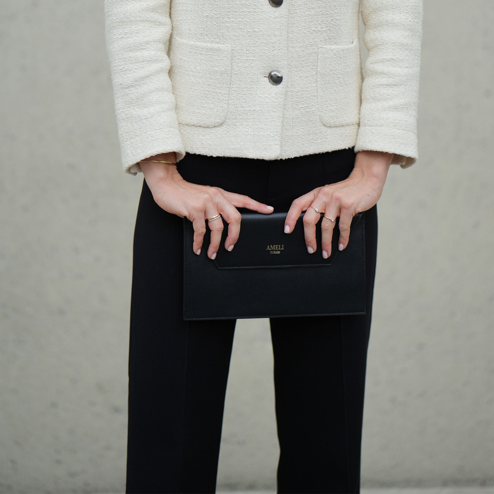 Black and shop beige clutch bag