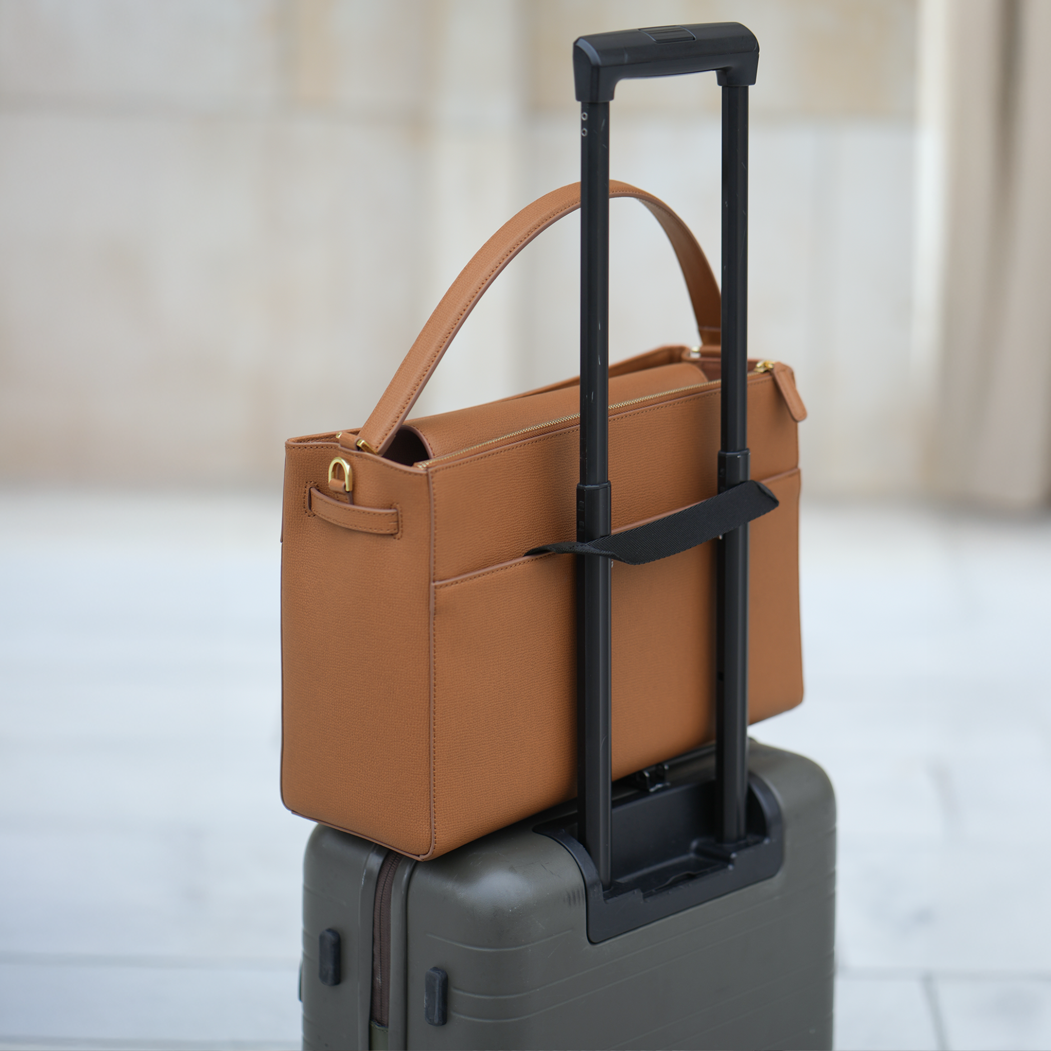 AMELI Zurich | SEEFELD | Cognac | Pebbled Leather | On suitcase