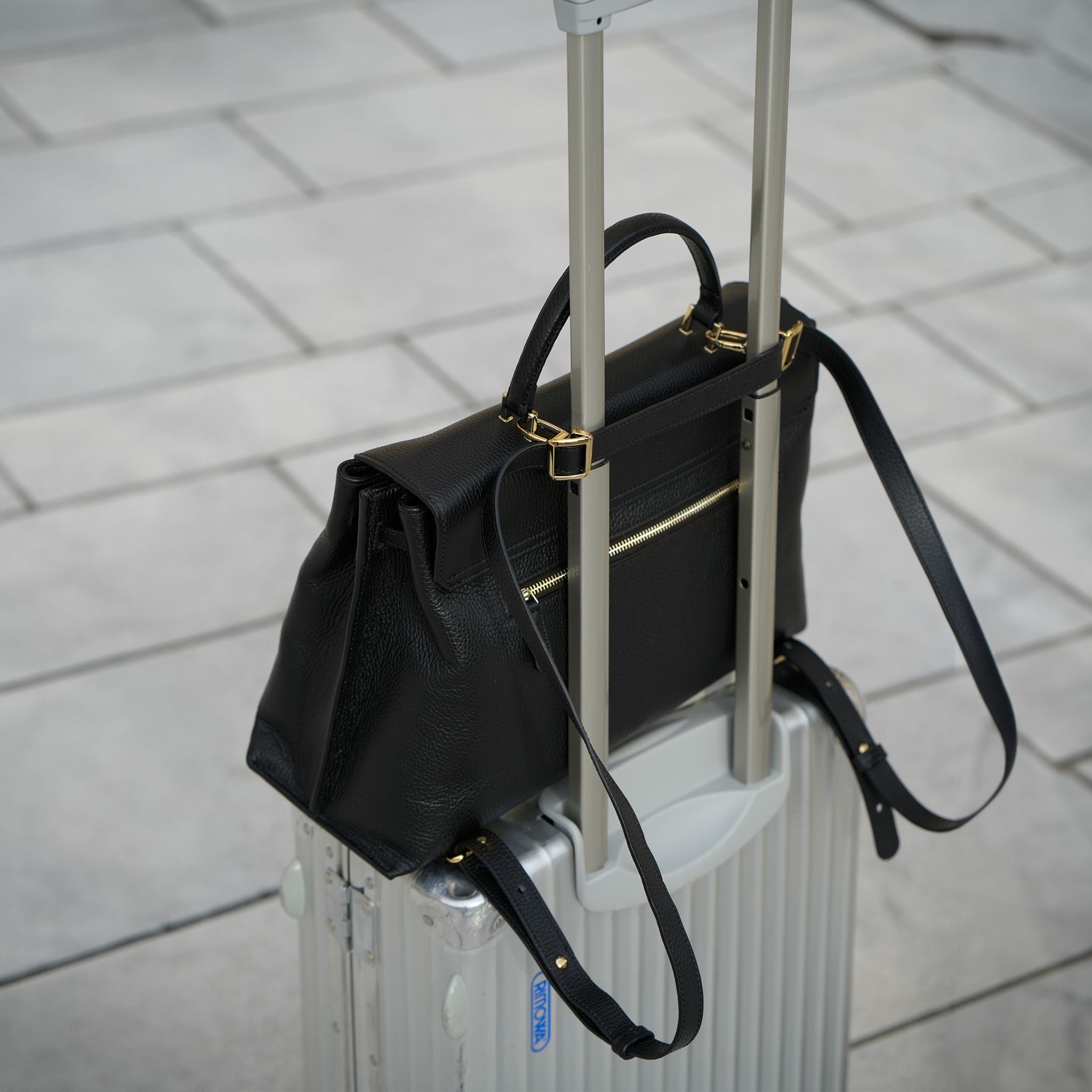 AMELI Zurich | VIADUKT WORK 24 | Black | Soft Grain Leather | Attached to the suitcase