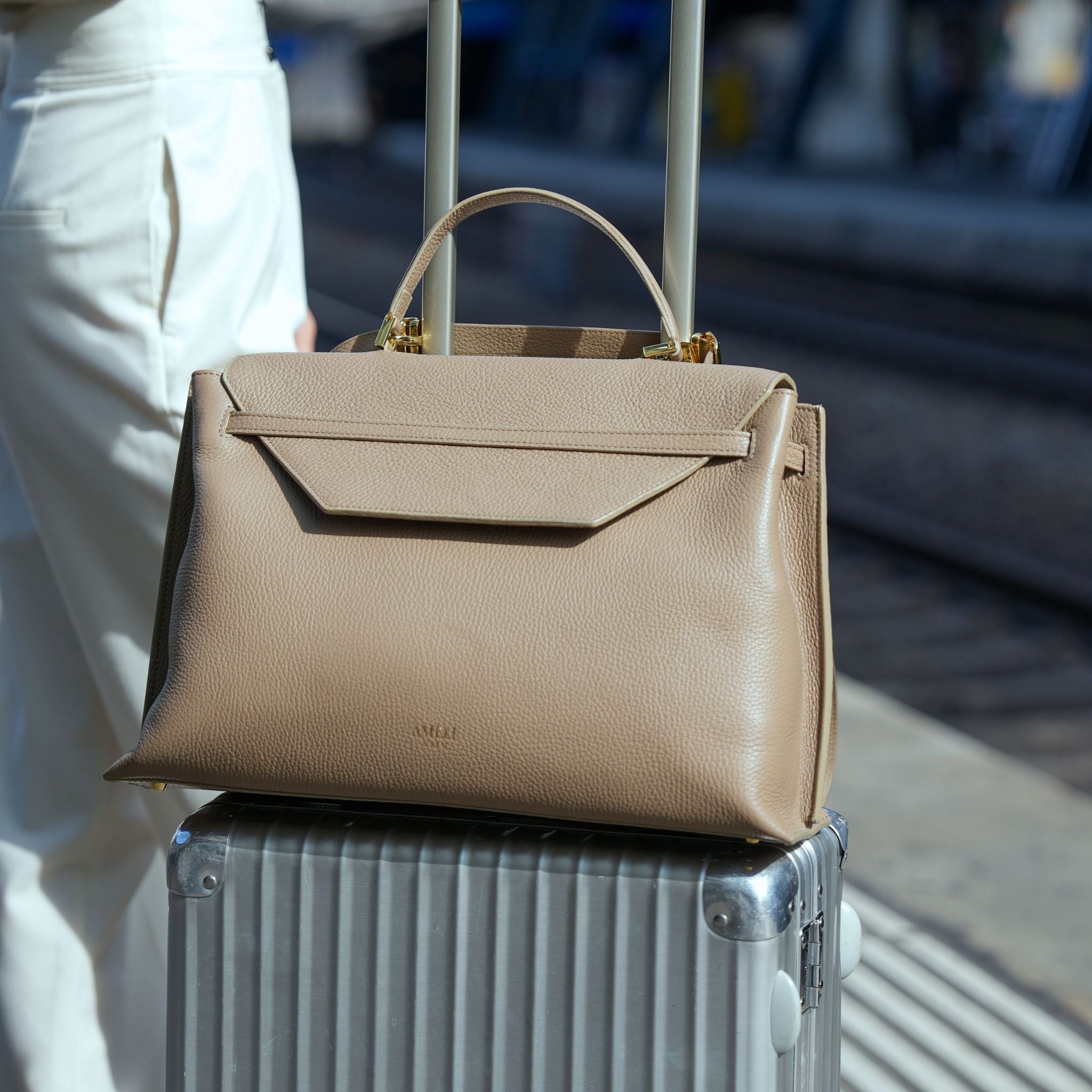 AMELI Zurich | VIADUKT WORK | Greige | Soft Grain Leather | On the suitcase